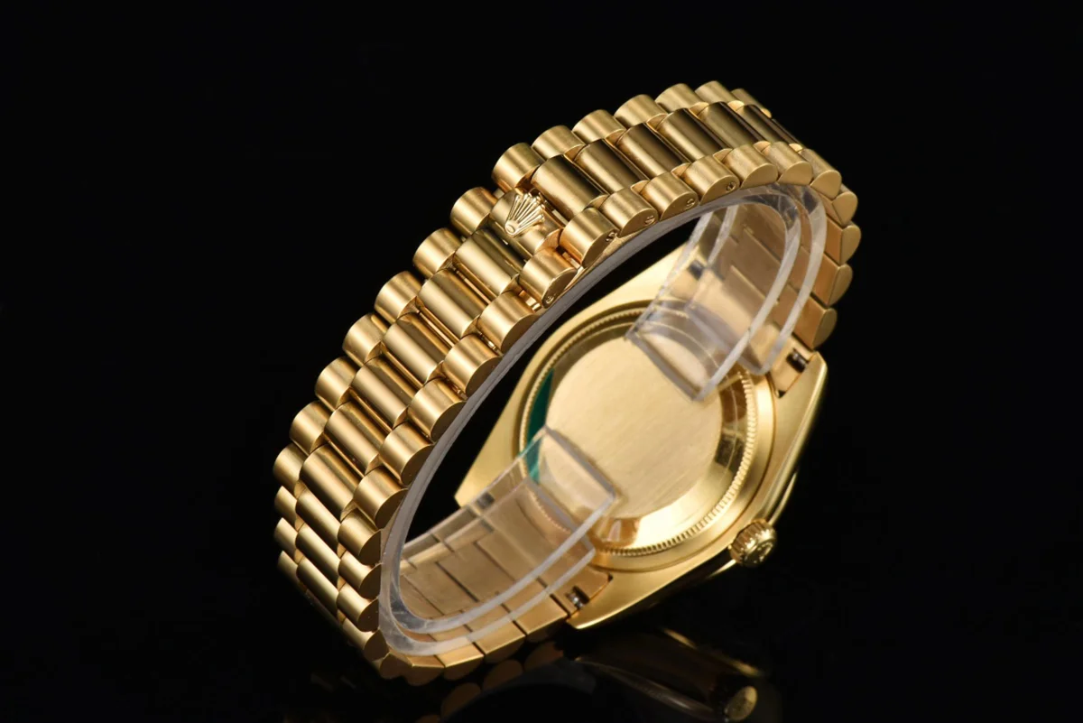 Daydate 36 128238 Turquoise Diamond Roman Dial in Yellow Gold